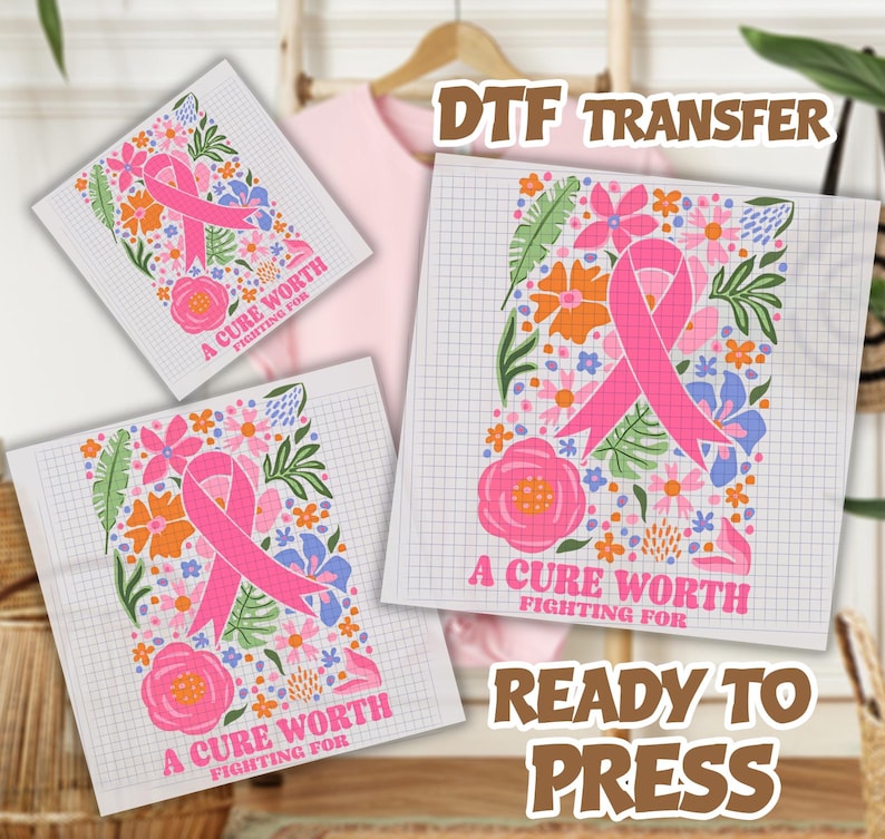 May include: Three DTF transfer sheets featuring a pink awareness ribbon surrounded by colorful floral and leaf illustrations on a grid background. The text A CURE WORTH FIGHTING FOR is printed in pink at the bottom of each design.