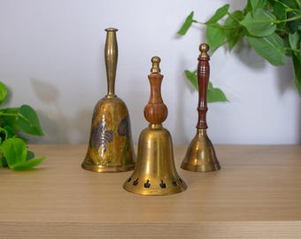 Vintage Brass Bell Trio | Mixed Style Hand Bells with Wood Handles | Etched Floral Bell | Cutout Base | Eclectic Boho Shelf Decor