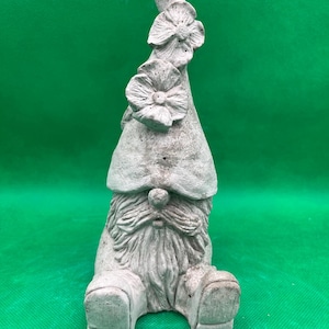 Gnome sitting man with flower on hat cast stone statue