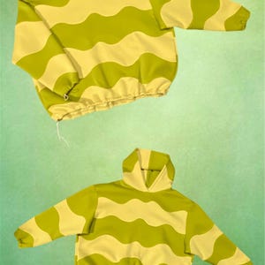 May include: Two hooded sweatshirts with a wavy pattern in shades of green and yellow. The sweatshirts have long sleeves, a drawstring at the waist, and a hood. The background is a solid green color.
