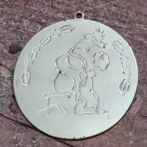 Vintage 1965 Peanuts Snoopy and Woodstock Silver Tone Medallion Christmas Ornament