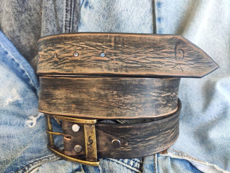 A black leather belt with brown spots that makes it look vintage simple black belt for jeans perfect for daily use and personalized option image 2