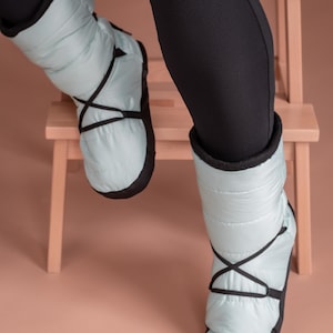 dance warm up boots
ballet booties
dance slippers warm
rehearsal shoes
studio warm shoes
dancer booties
ballet warm shoes
cozy dance shoes
insulated slippers
fleece dance shoes
warm studio shoes
quilted booties
dance footwear
ballet accessories
warm rehearsal shoes
indoor dance shoes
dancer gift shoes
soft dance slippers
winter dance shoes
studio booties