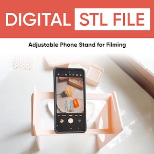 May include: A light pink adjustable phone stand for filming, featuring the text DIGITAL STL FILE and Adjustable Phone Stand for Filming. A black smartphone is mounted on the stand, displaying a camera interface with a flower and small objects.