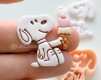 Cortador de helados para perros de Charlie: Un perro con helado en verano para arcilla polimérica.