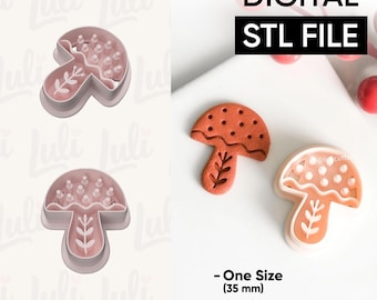 Pode incluir: A imagem mostra cortadores de biscoitos em forma de cogumelo e um biscoito assado. Os cortadores são rosa e brancos, com um desenho de folha. O biscoito assado é laranja com pontos brancos. O texto diz "DIGITAL STL FILE" e "One Size (35 mm)".