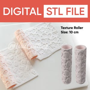 May include: A digital STL file for a texture roller measuring 10 cm. The cylindrical rollers are light pink and feature a repeating embossed pattern of small ghosts and stars. The image shows the rollers alongside impressions made in white clay.