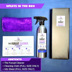May include: A StellarHusky Fursuit Cleaner kit containing a silver spray bottle with a black trigger, a purple microfiber cloth, and a white instructional sheet. The bottle label reads The Fursuit Cleaner, and a tall rectangular box is included.