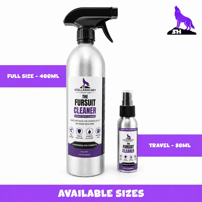 May include: Two silver metal spray bottles labeled The Fursuit Cleaner by StellarHusky. The larger bottle is 400ml with a black trigger sprayer, and the smaller travel-sized bottle is 80ml with a black pump cap. Both feature purple and white labels.