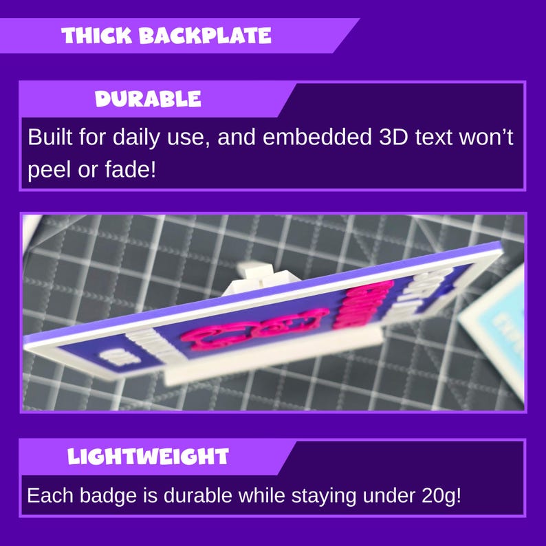 May include: A rectangular badge with a white frame, blue background, and pink text. The text reads "Durable" and "Lightweight". The badge is described as having a thick backplate and embedded 3D text that won't peel or fade. Each badge weighs under 20 grams.