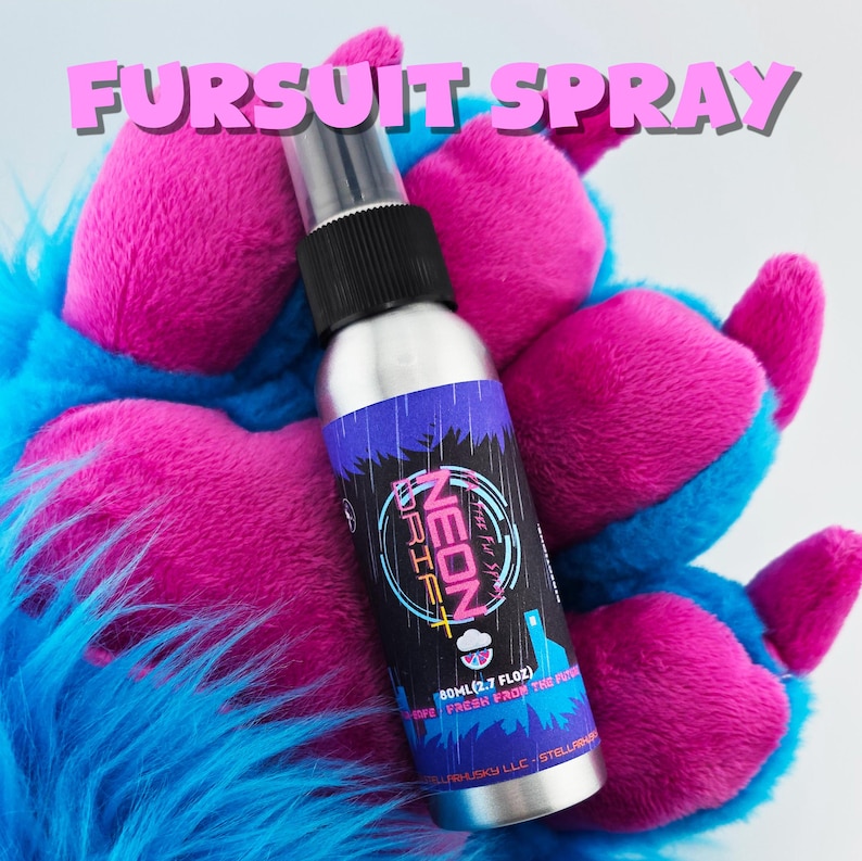 May include: A silver spray bottle with a black cap and a label that reads "NEON DRIFT" is held by a blue and pink furry paw. The text "FURSUIT SPRAY" is above the bottle. The bottle contains 80ml (2.7 fl oz) of product.