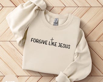 Sudadera con frase "Perdona como Jesús", ideal como regalo inspirador.