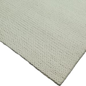 Puede incluir: Una alfombra tejida de color verde claro con una superficie texturizada.