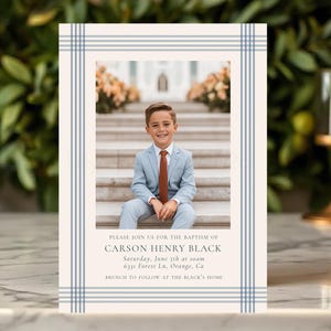 May include: Baptism invitation card featuring a photo of a young boy in a light blue suit and rust-colored tie. The card has a light blue and white striped border. Text on the card reads "Please join us for the baptism of Carson Henry Black."