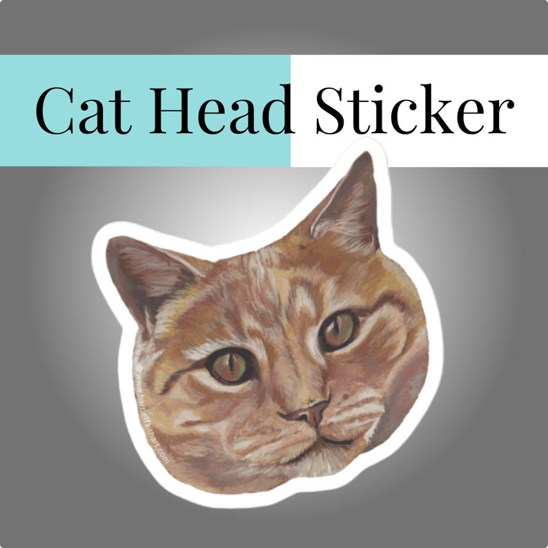 Orange cat head sticker from Realistic painting. Sticker has white edge around cat image. Centered in picture againt grey background with white glow. Banner has background of turquoise and white with black letters and reads Cat Head Sticker.