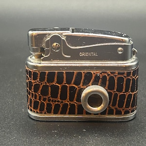 Oriental “peep show” Lighter