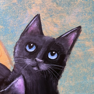 May include: A close-up painting of a black cat with bright blue eyes and a slight smile. The cat's fur is a deep black, with purple accents on the ears. The background is a textured blend of light blue and yellow.