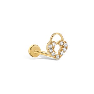 May include: Gold heart-shaped lock with clear cubic zirconia stones, a popular choice for cartilage piercings.