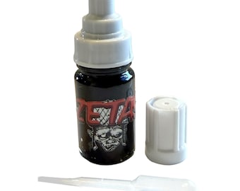 Lil Zetas Refillable glass body marker.