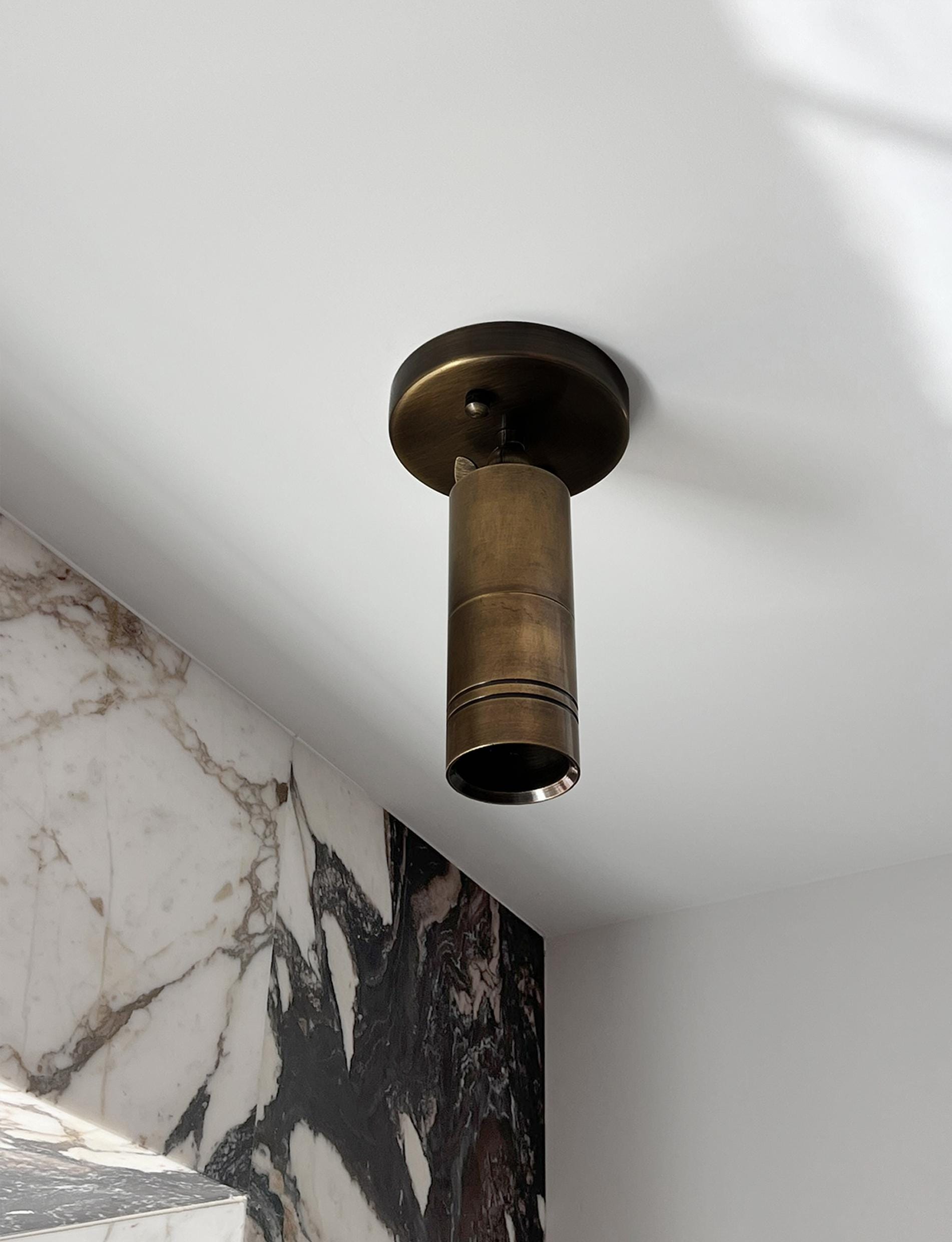 Aged Brass Spotlight: Mid-Century Modern Directional Lighting