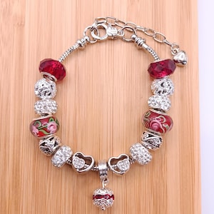 Pandora style Silver and Red Charm bracelet complete with 15 charms