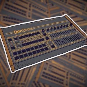 May include: A sticker featuring a vintage LinnDrum drum machine. The design has a gray body with gold accents, knobs, and buttons. The text "LinnDrum" is visible on the top. The sticker has a white border and a wood-grain effect on the sides.