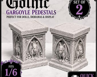 May include: A set of two light gray stone-textured pedestals featuring carved gargoyle figures within arched gothic frames. The square-topped display stands include text reading Gothic Gargoyle Pedestals, Set of 2, and Fits 1/6 Scale Dolls.