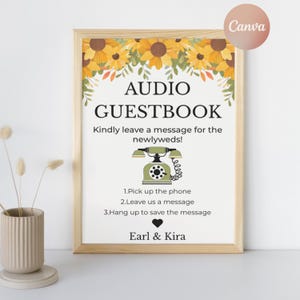May include: A framed sign with the text "AUDIO GUESTBOOK" and instructions for leaving a message for the newlyweds. The sign features a sunflower design at the top and a vintage telephone illustration. The names "Earl & Kira" are at the bottom.