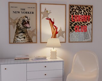 May include: Three framed art prints with a luxury theme. One features a leopard and the text "The New Yorker". Another shows legs in red heels with a cocktail. The third print says "Luxury Club" with a leopard print background.