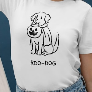 A bundle of 30 hand-drawn whimsical Halloween pup illustrations featuring dogs in spooky cute costumes, including ghost puppies, witch dogs on broomsticks, skeleton pups, pumpkin costume dogs, and trick-or-treating puppies. Perfect for digital crafts, stickers, invitations, sublimation, and Halloween decorations. Includes SVG, PNG, and EPS formats for Cricut, Silhouette, and other design software. Whimsical, playful, and perfect for pet lovers and Halloween projects.