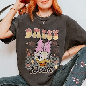 Camiseta retrô Daisy Duck, camiseta retrô Disneylândia, camiseta de viagem em família Disney, camisetas combinando férias em família Disney.