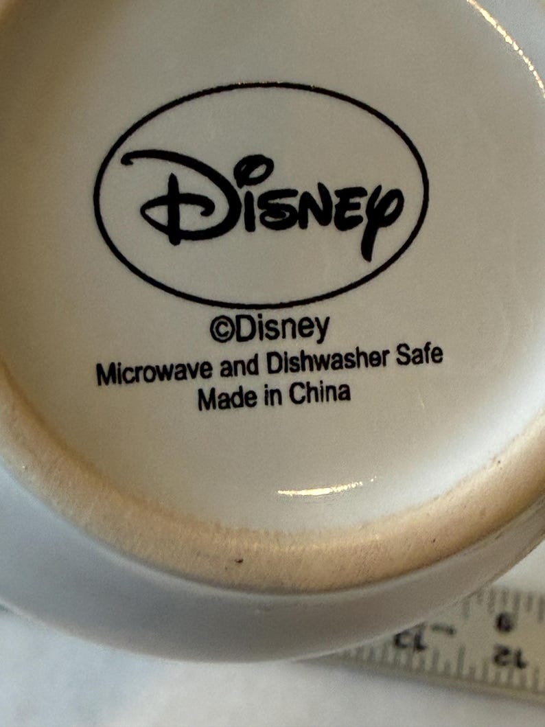 May include: A set of three ceramic mugs with a speckled, matte finish in cream, light brown, and dark brown. Each mug features a minimalist design, ideal for tea or coffee.