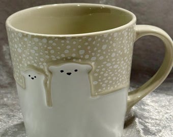 This item is a 2016 Starbucks Holiday Polar Bear Mug