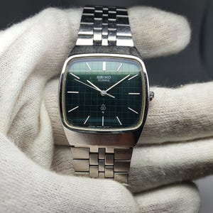 ヴィンテージ SEIKO 7730-5030 銀文字盤 タンク 1985年 il_300x300.7254454906_rg05.jpg