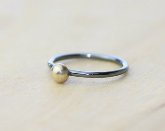 Solid 18 K Gold Ball Ring on Silver Black Oxidized Ring Band