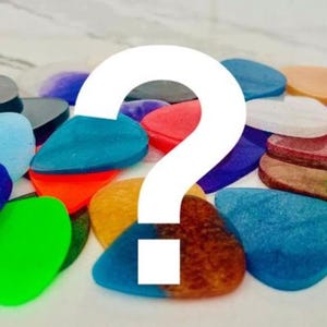 Mystery Guitar Pick Pack: 6 Acrylic Plectrums in Canvas Bag