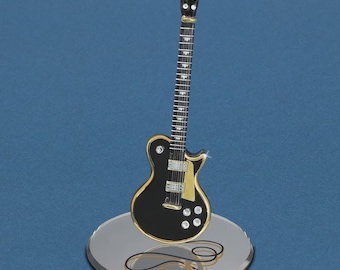 Guitarra clásica en miniatura de cristal negro
