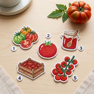 May include: Five embroidered patches featuring tomato themes labeled with numbers one through five. Designs include a cluster of tomatoes, a single red tomato, a jar of tomato sauce with a wooden spoon, a wooden crate of sliced tomatoes, and vine tomatoes.