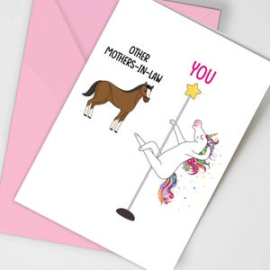 May include: A greeting card with a unicorn holding a star on a pole and a horse. The card says "Other Mothers-in-Law" above the horse and "You" above the unicorn.