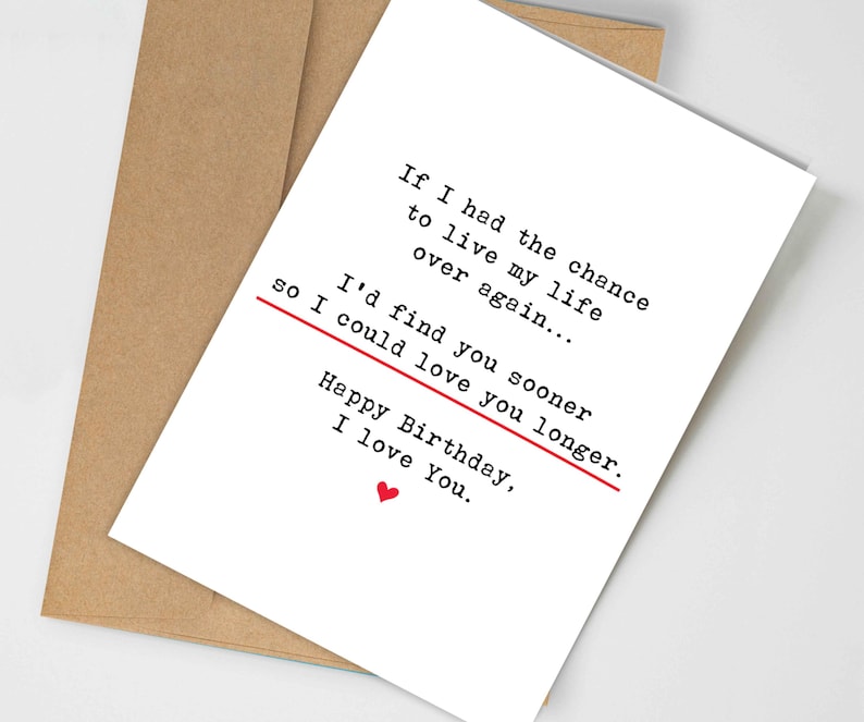 May include: A white greeting card with black text and a red heart. The card reads, "If I had the chance to live my life over again... I'd find you sooner so I could love you longer. Happy Birthday, I love You." The card is inside a brown envelope.