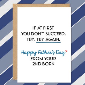 May include: A Father's Day greeting card with a white background and brown border. The card features the text "IF AT FIRST YOU DON'T SUCCEED. TRY. TRY AGAIN." in black, and "Happy Father's Day" in blue.