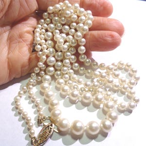 Pearl Necklace is 1940s Antique Faux Glass Pearl 36&quot; Opera Length Graduated Necklace with Silk Knotted Pearls and a GF Fish Hook Clasp