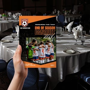 May include: A rectangular flyer for a soccer club end of season banquet. The design features an orange and black color scheme with the text 'END OF SEASON BANQUET 202X' and a photograph of a group of soccer players in white jerseys huddled together.