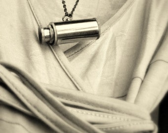 Penelope I see you... a steampunk vintage gold brass magnifying telescope pendant necklace...
