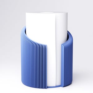 May include: A modern blue toilet paper holder with a vertical slatted design. The holder is a cylinder shape and partially surrounds a white roll of toilet paper. The design is minimalist and contemporary.