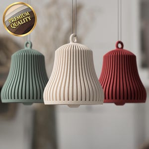 May include: A white ceramic mug with a black handle and the text "But First, Coffee" in a handwritten style. The mug is on a white surface. The mug is approximately 10 cm tall.