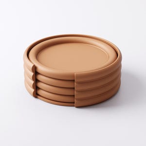 Puede incluir: Una pila de cinco posavasos redondos de color terracota. Cada posavasos tiene un borde elevado y un centro plano. La pila est&aacute; parcialmente cortada por un lado, revelando la construcci&oacute;n en capas. Los posavasos est&aacute;n dise&ntilde;ados para proteger las superficies de las marcas de bebidas.