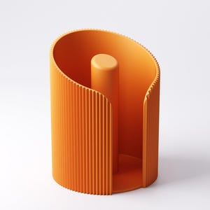 May include: An orange paper towel holder with a vertical, ribbed design on the exterior. The holder has a cylindrical shape with a central post for the paper towel roll. The design is modern and minimalist.