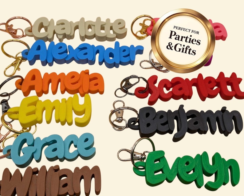 May include: A collection of colorful name keychains in various colors, including beige, blue, orange, yellow, red, black, teal, and brown. Each keychain features a different name in a bold, 3D font, attached to a metal keyring.
