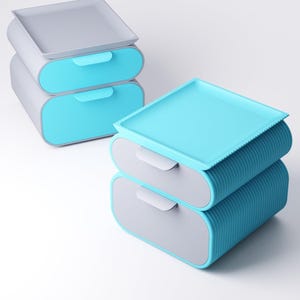 May include: Two sets of stackable storage drawers. One set features light grey frames with bright cyan drawer fronts and a light grey top tray. The other set has bright cyan ribbed sides, a bright cyan top tray, and light grey drawer fronts.